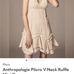 ISO Anthropologie Cream Ruffle V-Neck Dress in medium